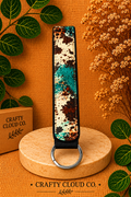 Turquoise Cowhide Wristlet