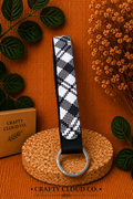 B&W checkered wristlet