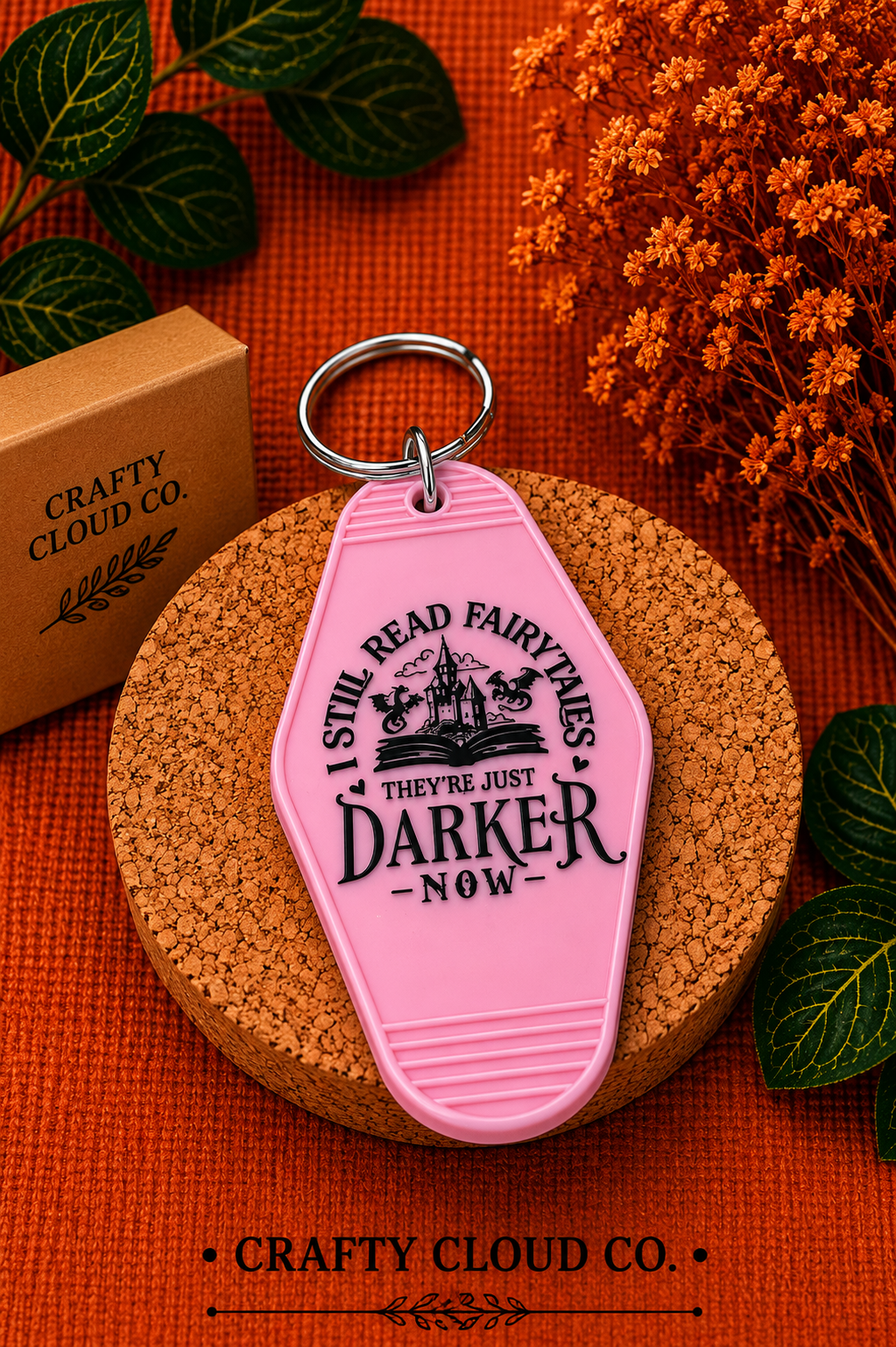 I Still Read Fairytales, They're Just Darker Now Motel Keychain (Pink)