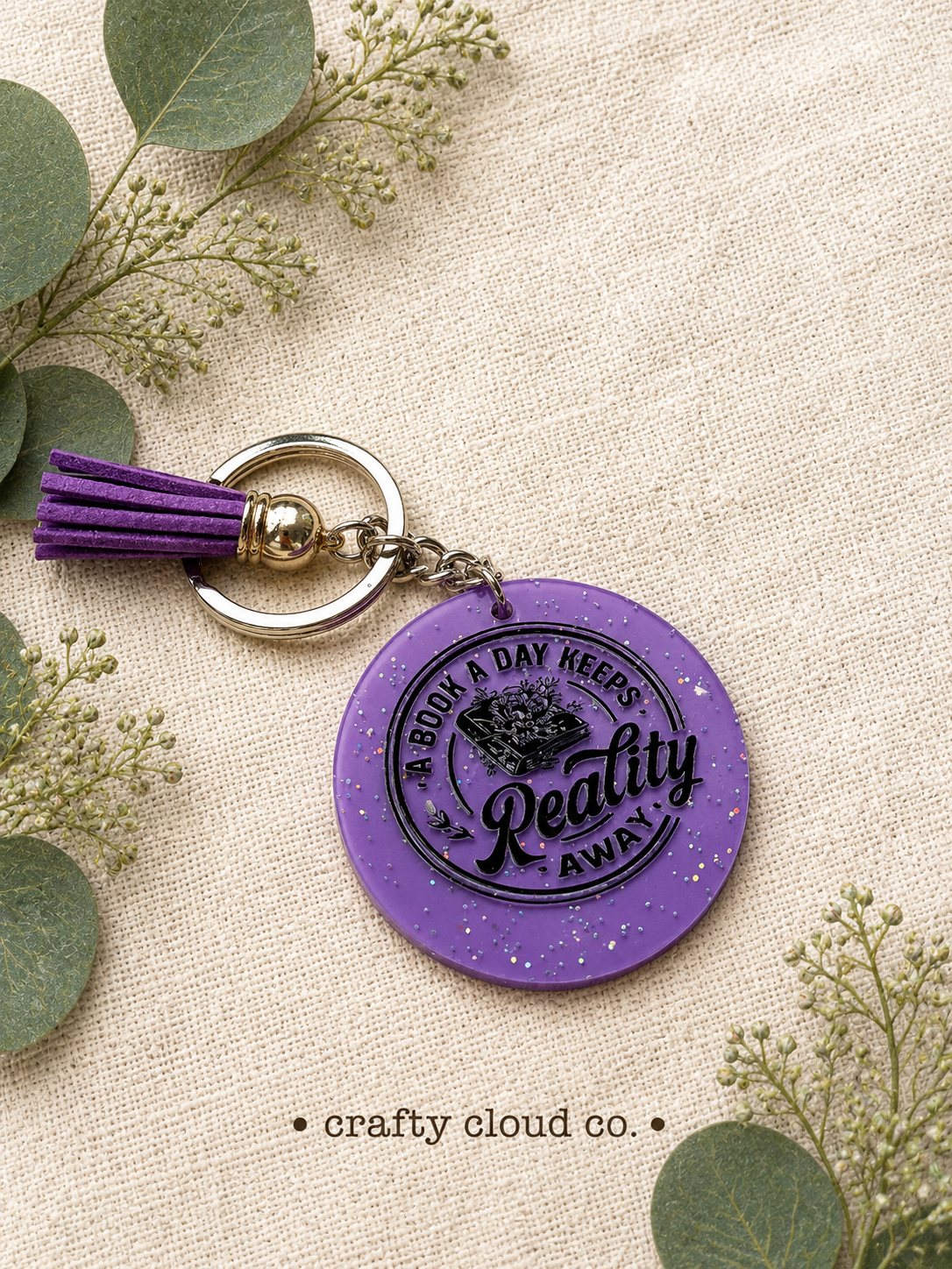 A Book A Day Keeps Reality Away Keychain