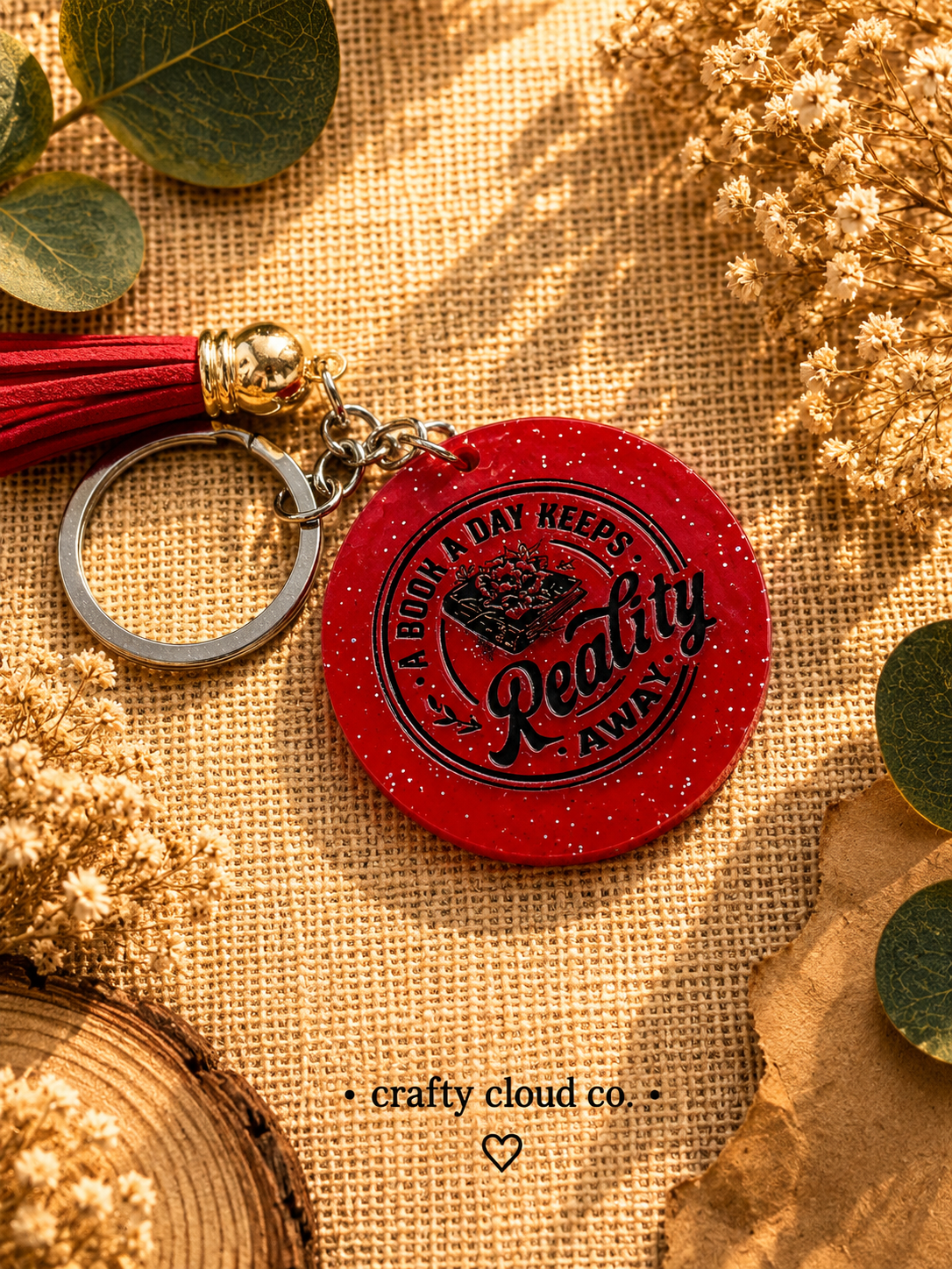 A Book a Day Keeps Reality Away Keychain