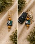 Have The Day You Deserve Keychain